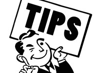 man with "tips" sign
