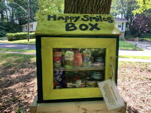 Happy Smiles Box photograph with canned goods and non-perishables for the community