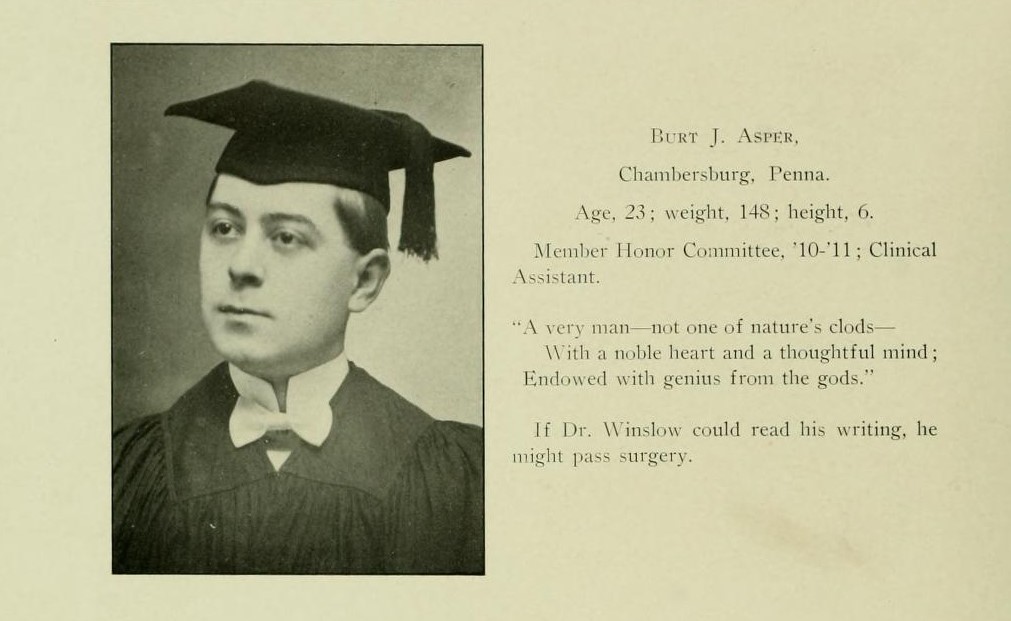 Yearbook photograph of man in graduate cap and gown.