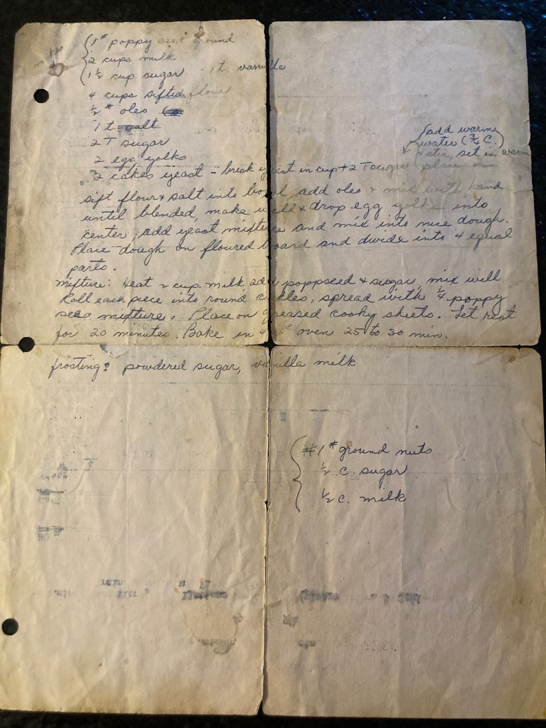 Handwritten recipe for poppyseed rolls, the well-worn paper has been folded in quarters and shows a lot of wear and age