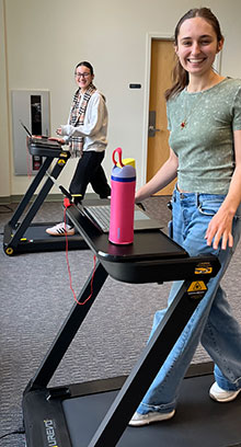 Students Walking on Treadmills