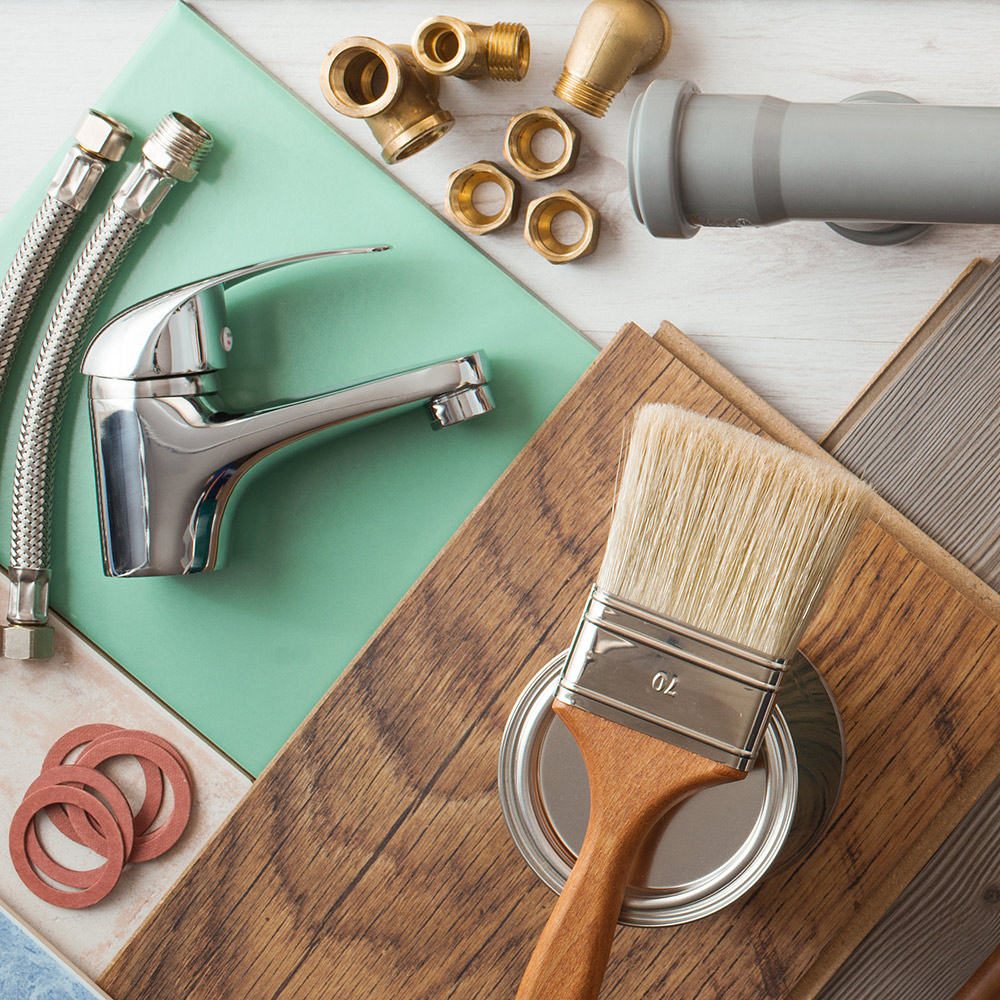 Restroom fixtures and a paint brush.